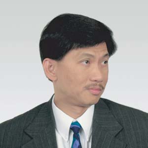 Photograph in which the head is turned away from the camera, which is not acceptable